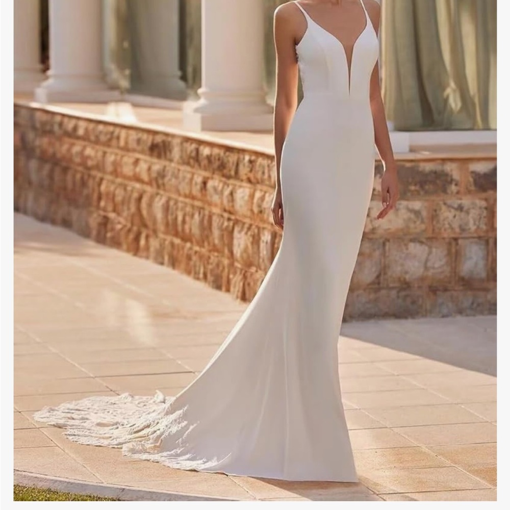 Brand new never worn  Satin Wedding Dress size 4